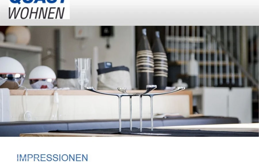 Quast Wohnen Olpe - Werbefoto 2 mit Logo